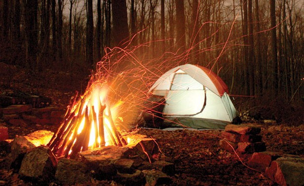 Campfire lights the night