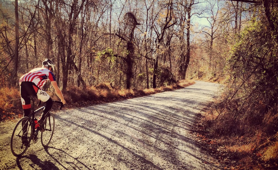 Connor Bell, U23 US National team rider climbs a dirt road. From my Instagram @curtiswinsor