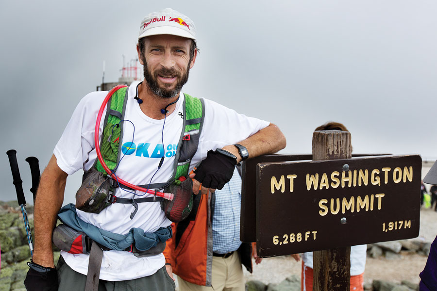 Karl Meltzer stops for a portrait at the summit of Mount Washington while attempting to break the record for fastest completion of the Appalachian Trail on Mount Washington in Gorham, New Hampshire on August 4, 2014 // Brian Nevins/Red Bull Content Pool // P-20140813-00236 // Usage for editorial use only // Please go to www.redbullcontentpool.com for further information. //