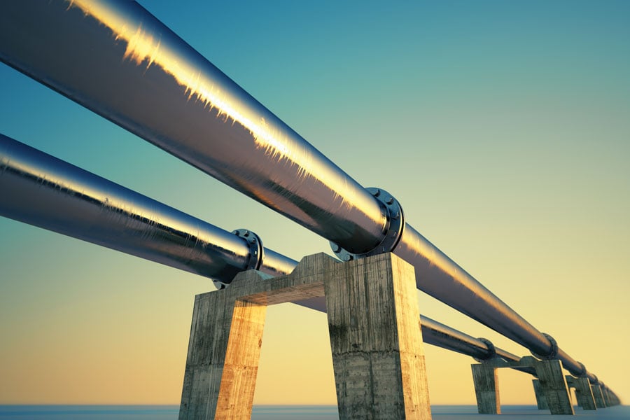 Bottom shot of a pipeline at sunset. Pipeline transportation is most common way of transporting goods such as Oil, natural gas or water on long distances.